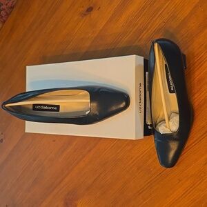 Womens black leather pumps. Suze 8. 2.5 inch high heel.